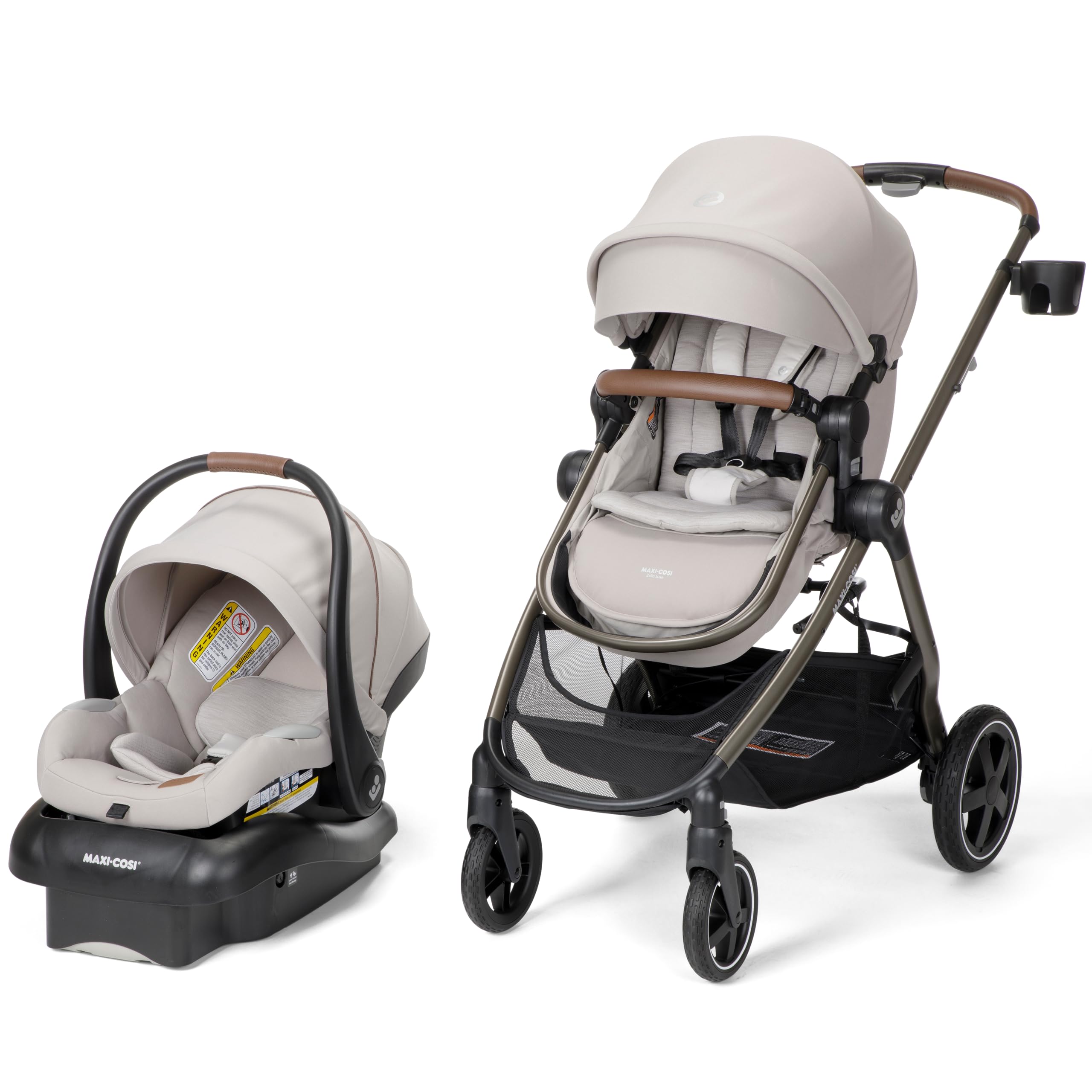 Maxi-Cosi Zelia™ Luxe 5-in-1 travel system with stroller and car seat, featuring a sleek black frame and fabric seats.