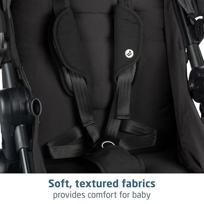 Maxi-Cosi Zelia Luxe 5-in-1 modular travel system with stroller, car seat, and accessories in stylish fabric.