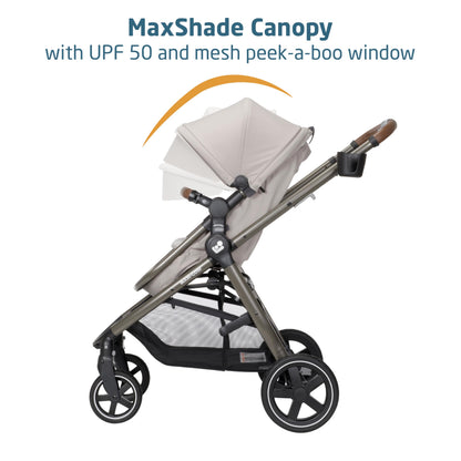 Maxi-Cosi Zelia Luxe 5-in-1 travel system with stroller and car seat, featuring adjustable handle and modern design.