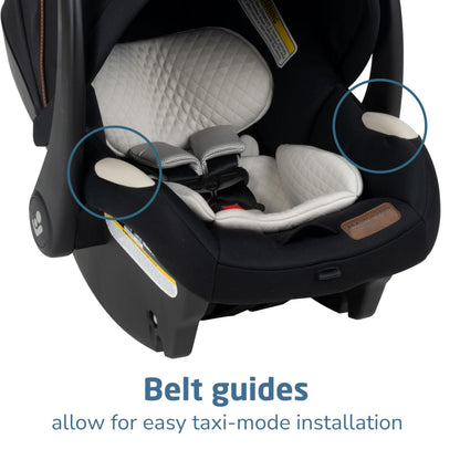 Maxi-Cosi Zelia Luxe 5-in-1 modular travel system with stroller and car seat, featuring adjustable handle and fabric details.