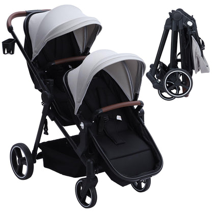 Black tandem stroller for twins with reversible seats, adjustable canopy, one-hand fold, and large storage basket.