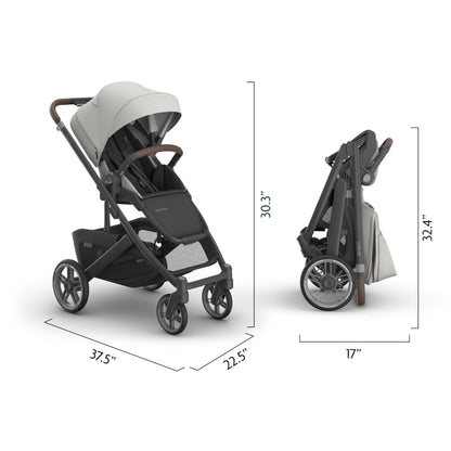 UPPAbaby Cruz V3 stroller in Greyson with reversible seat, infant insert, bug and rain shields, charcoal mélange frame, saddle leather accents.