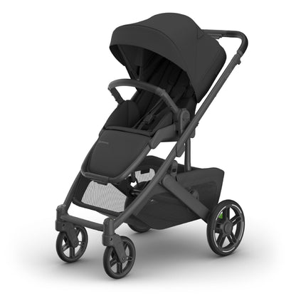 UPPAbaby Cruz V3 stroller in Greyson with charcoal Mélange fabric, reversible seat, infant insert, and included bug and rain shields.
