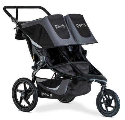 My Store BOB Gear Revolution Flex 3.0 Duallie jogging stroller in graphite black with adjustable handlebars and large tires.