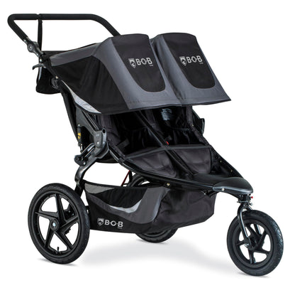 My Store BOB Gear Revolution Flex 3.0 Duallie jogging stroller in graphite black, showing the double stroller with adjustable handlebars.
