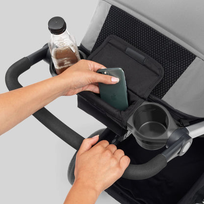 Chicco Bravo 3-in-1 travel system with quick-fold stroller, KeyFit 30 infant car seat, and base in Camden/Black color, outdoors.