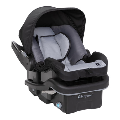 Baby Trend Passport Switch 6-in-1 stroller travel system with EZ-Lift infant car seat in Dash Black, featuring adjustable modes and sleek design.