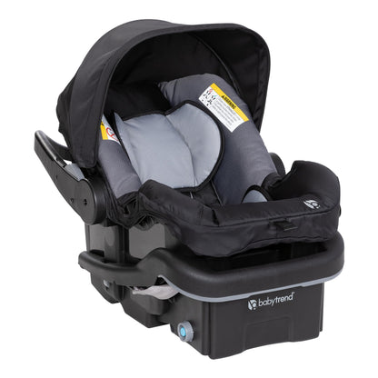Baby Trend Passport cargo stroller with pink bamboo fabric and EZ-Lift Plus infant car seat, featuring a compact travel system.